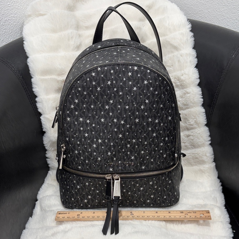 Black Star-Patterned Backpack - image 1